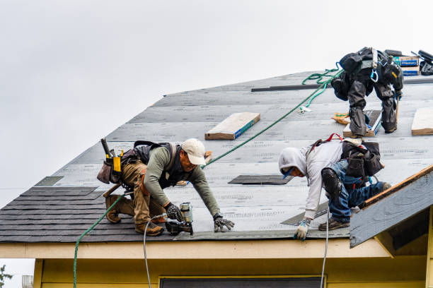 Professional Gutter Installation technician working in Bath, MI
